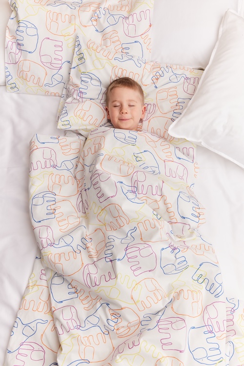 Lasten pussilakanasetti 120x160 cm. Tuote on 100 % luomupuuvillaa ja kasviväripainettu